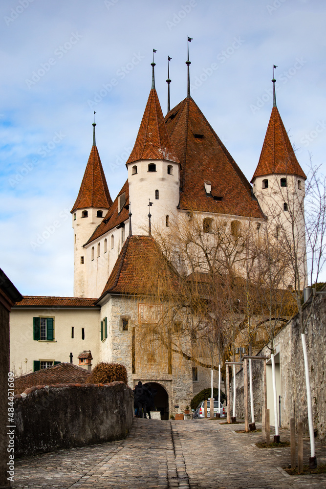 Thun Castle seen from the typical medieval street. City of Thun, Canton of Bern, Switzerland. The city of Thun is a tourist attraction in Switzerland.