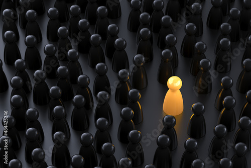 Schilderij op canvas Yellow game pawn among dark ones. Standing out of crowd concept