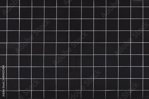 Black tile texture with white seams