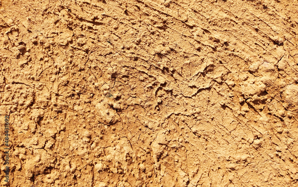Cracked ground background in the top view for graphic design or wallpaper Cracked ground background in the top view for graphic design or wallpaper