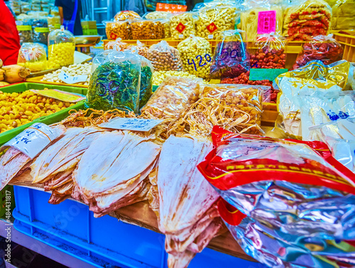 The showcase of the stall of Sampheng market offers variety of traditional thai snacks, Bangkok, Thailand photo