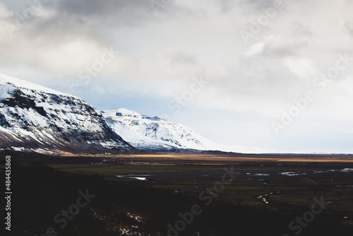 Snow Covered Icelandic Mountains on a Cloudy Day