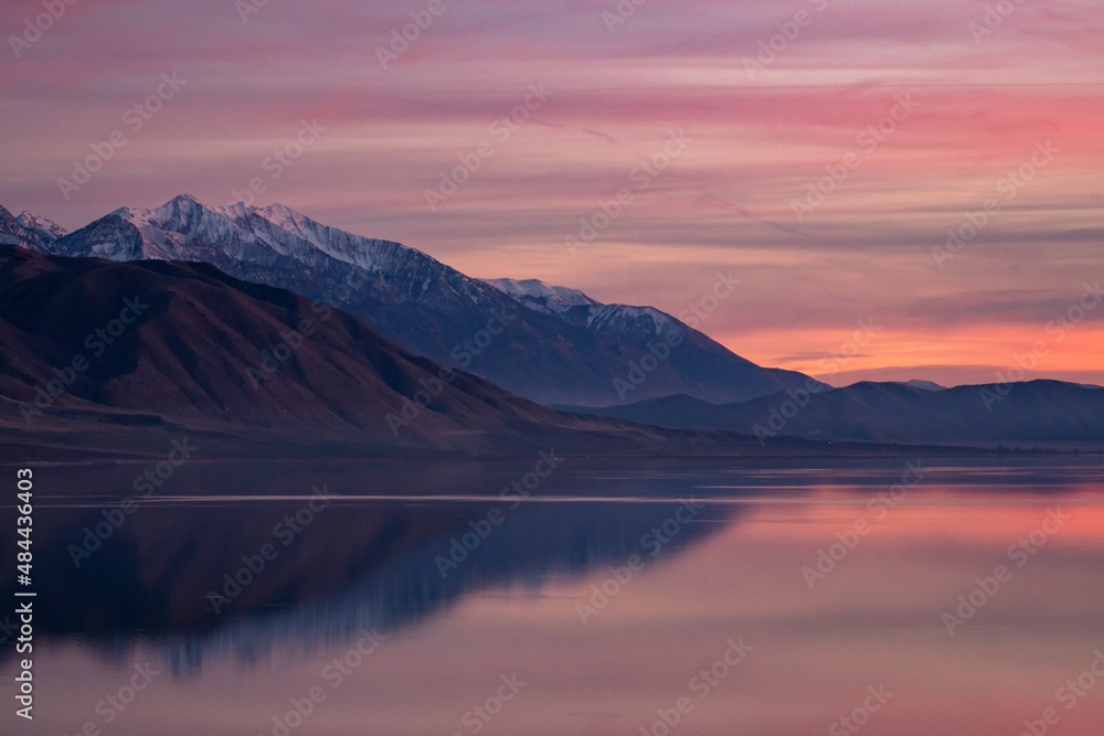Waves of color over Utah Lake during sunset looking towards MT. Nebo