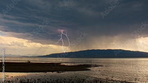 Lighting strike from thunder storm moving over Utah Lake