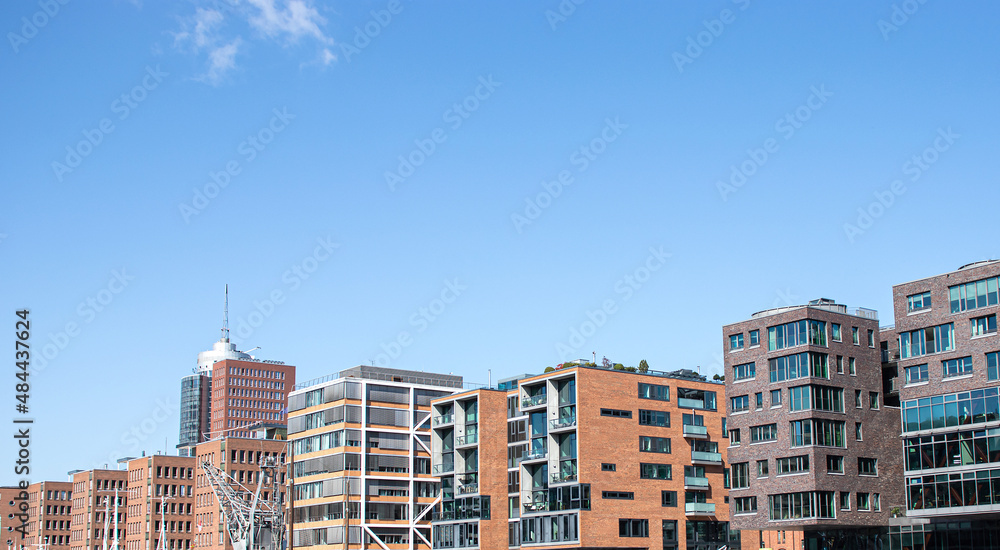 Facades of modern buildings in the city of Hamburg Germany. Hamburg city on a sunny day. Residential area in the city. modern architecture. Multi-story houses. Office building. Rent an apartment