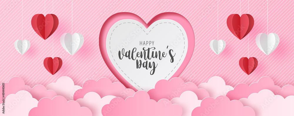 Paper cut of Happy Valentine's Day text on white heart with origami paper heart shape on pastel color background for greeting card, banner, poster, headers website