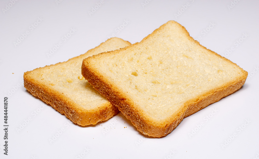 slices of rusks on a white background
