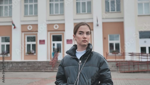 Wallpaper Mural Spinning around a lonely girl in the middle of town. Torontodigital.ca