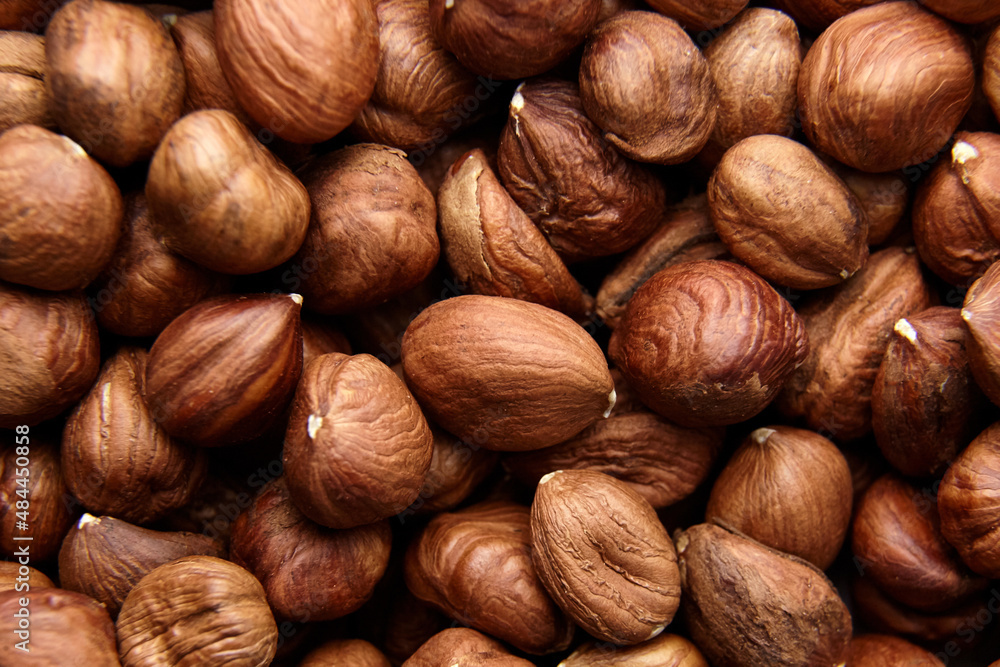 Shelled raw hazelnuts background closeup Shelled raw hazelnuts background closeup