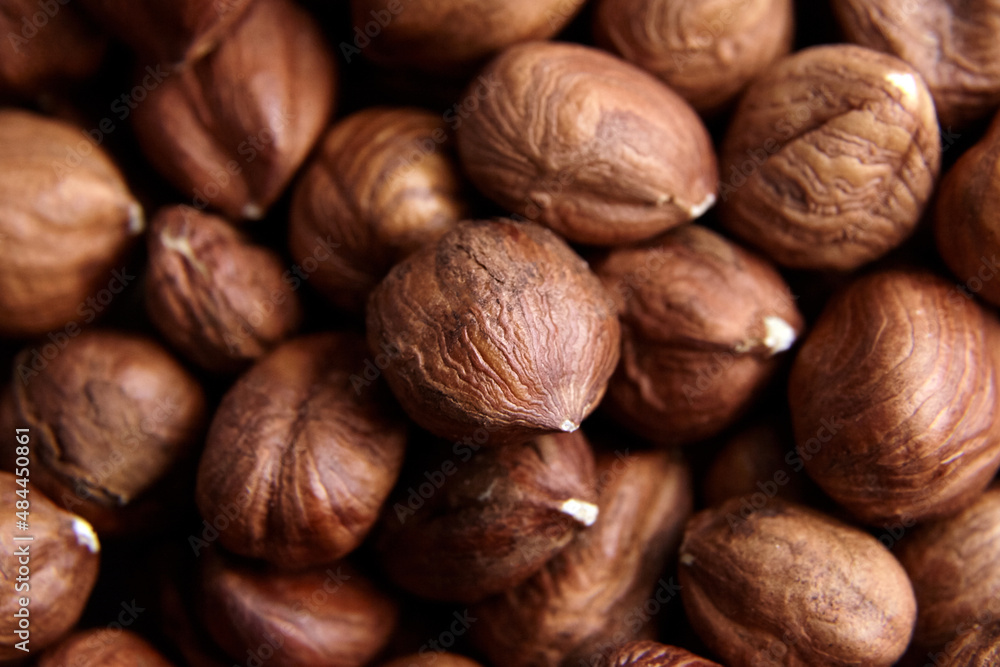 Shelled raw hazelnuts background closeup Shelled raw hazelnuts background closeup