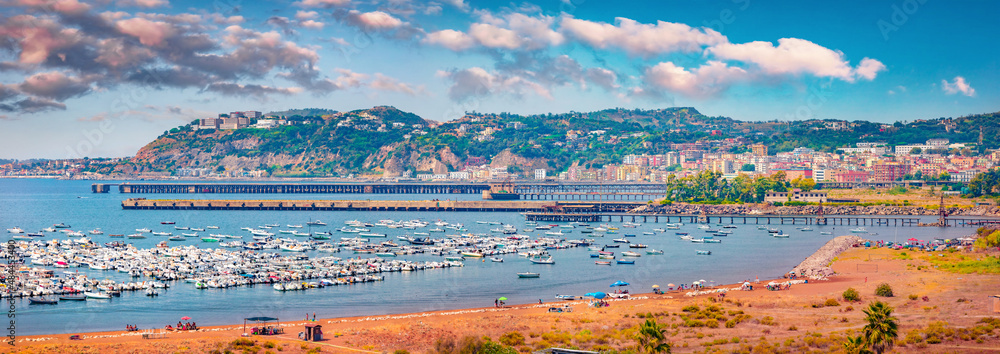 Panoramic morning view of Pozzuoli port. Superb summer seascape of Mediterranean seascape. Picturesque outdoor scene of Italy, Europe. Traveling concept background.