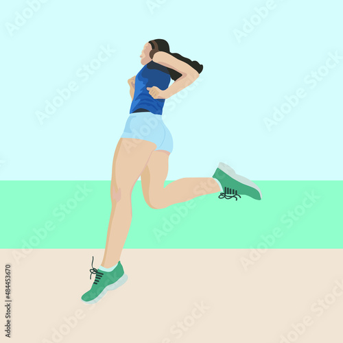 Woman running on beach ,doing a morning jog by the sea,in sportswear,in sneakers.