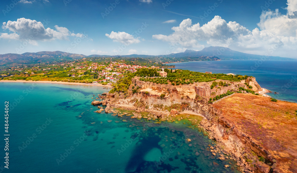 Aerial view from flying drone of east coast of Ionina sea. Colorful summer scene of Koroni town, Messenia, Peloponnese, Greece, Europe. Traveling concept background. Aerial view from flying drone of east coast of Ionina sea. Colorful summer scene of Koroni town, Messenia, Peloponnese, Greece, Europe. Traveling concept background.