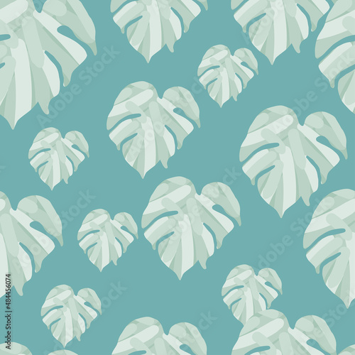 Monstera leaves tropical seamless pattern. Palm leaf endless wallpaper.