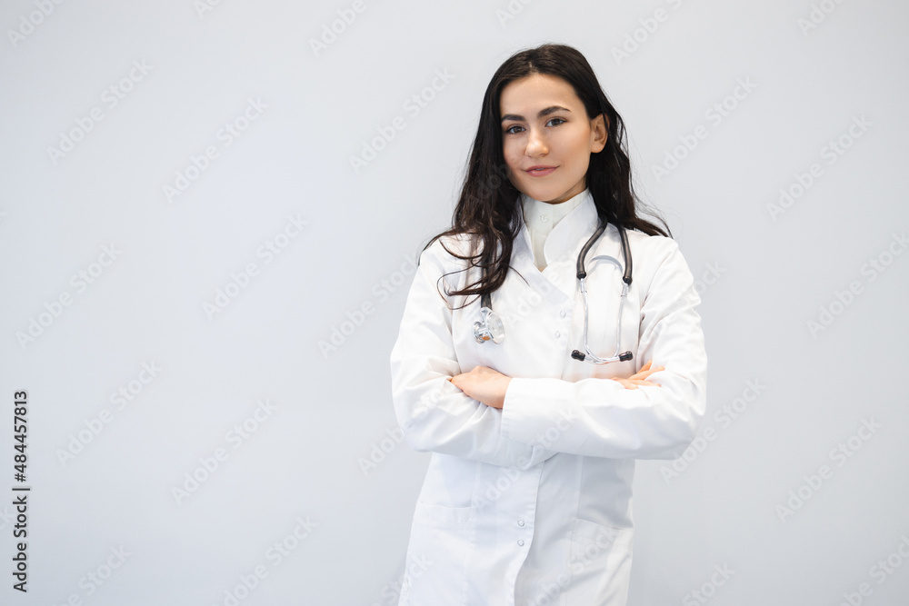 Portrait of confident female doctor with arms crossed Portrait of confident female doctor with arms crossed