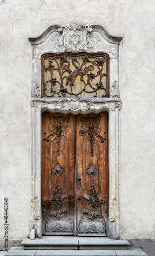 Carved wooden old door © konoplizkaya