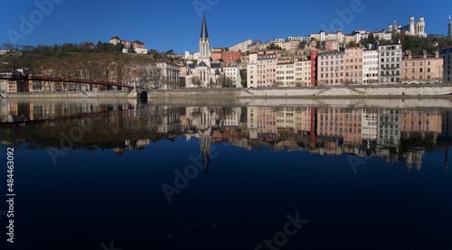Panorama of old lyon in France with in the foreground the river Saone with church Saint George, and basilica Notre Dame de fourviere.