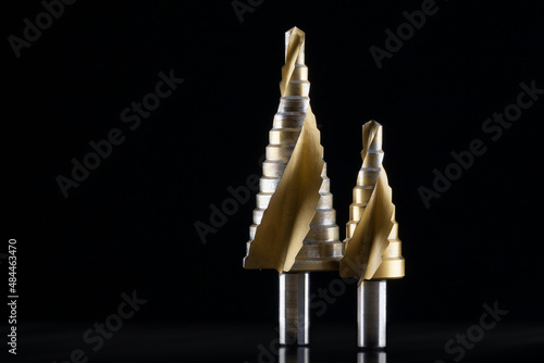 Step drill bits are ideal for drilling holes in all common industrial materials up to 4.0mm thick. One of the areas of application is the installation of cable bushings.  photo