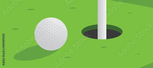 golf ball and playing golf on green ground