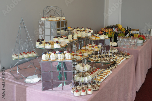 Raw colorful candy bar. table with sweets at a party
