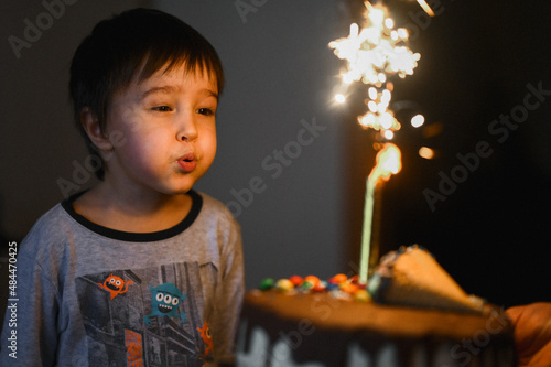 Canvas Print a three-year-old boy is celebrating his birthday