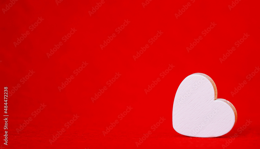 Hearts on a red background. Valentine's Day. Selective focus. Hearts on a red background. Valentine's Day. Selective focus.