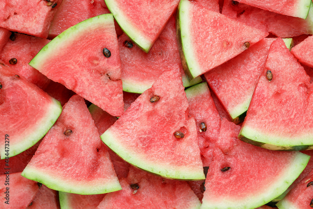 Slices of tasty ripe watermelon as background, top view Slices of tasty ripe watermelon as background, top view
