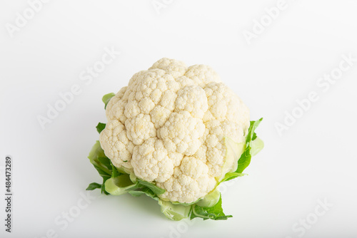 Isolated cauliflower over white, studio shot with single piece, includes copy space.