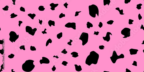 Pink cheetah fur abstract simple seamless pattern. Animal camouflage skin endless texture. Organic irregular dotty backdrop. Dalmatian, cow or jaguar coat texture. Fabric surface design