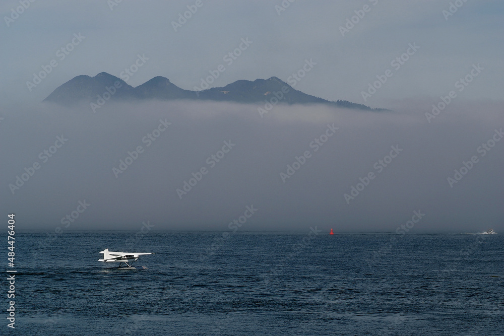A Float Plane Taxis Through the Water in Tofino on Vancouver Island in Canada