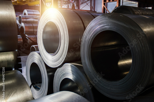 Rolls of galvanized steel sheet inside the factory or warehouse photo