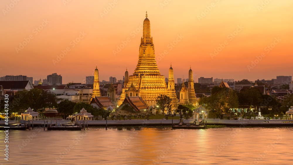 Beautiful view of Wat Arun Temple at sunset in Bangkok, Thailand.