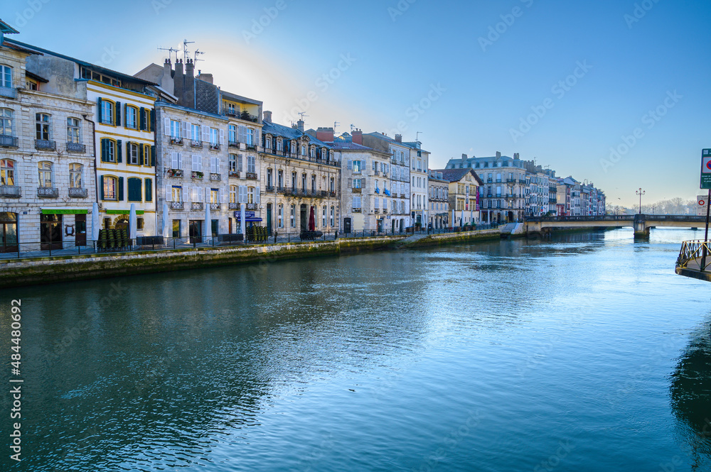 photography of petit bayonne from the quai Amiral Lespes we can see the river Nive and the buildings of the quai des Corsaires in the background the pont Marengo. A sunny winter morning with nobody on