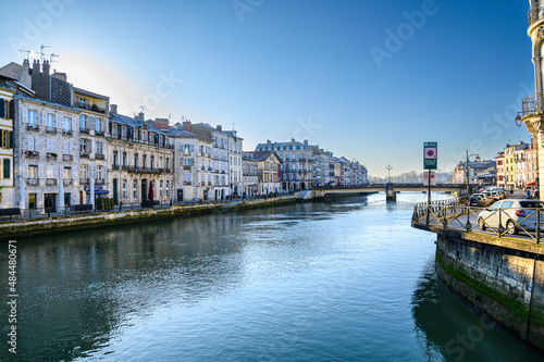 photography of petit bayonne from the quai Amiral Lespes we can see the river Nive and the buildings of the quai des Corsaires in the background the pont Marengo. A sunny winter morning with nobody on