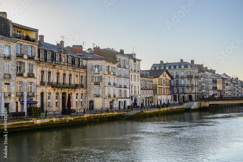 photography of petit bayonne from the quai Amiral Lespes we can see the river Nive and the buildings of the quai des Corsaires in the background the pont Marengo. A sunny winter morning with nobody on
