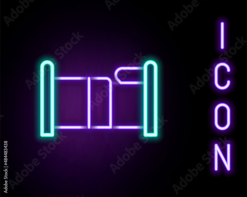 Glowing neon line Bed icon isolated on black background. Colorful outline concept. Vector
