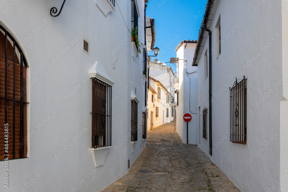 One of the many narrow winding alleys of homes in the Pueblo Blanco, or White Village of Grazalema, in the Andalusian mountains of southern Spain.