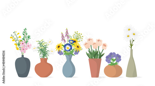 A set of bouquets of spring flowers in clay vases.Vector illustration.