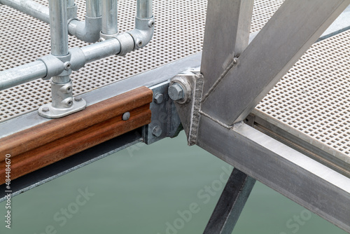 FINDOCHTY,MORAY,SCOTLAND - 2 FEBRUARY 2022: This is the structure showing the nouts, bolts and welding in the new Pontoons at Findochty Harbour, Moray, Scotland on 2 February 2022