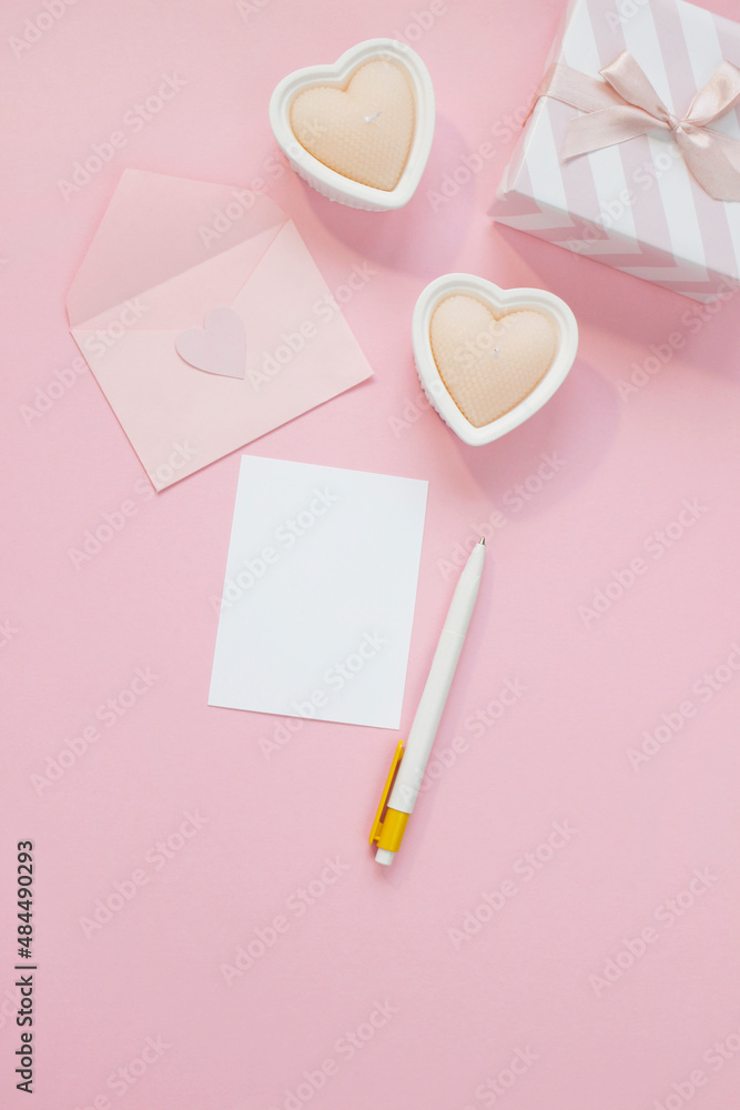 Happy Valentines Day composition. Blank greeting card mockup, gift boxes, hearts, confetti on pink background Happy Valentines Day composition. Blank greeting card mockup, gift boxes, hearts, confetti on pink background