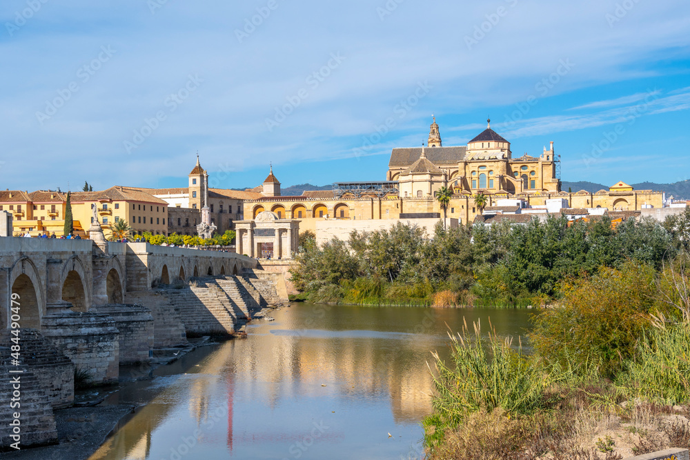 The Great Mosque of Córdoba or Mezquita seen from the Roman Bridge along the Guadalquivir River in Cordoba, Spain.
