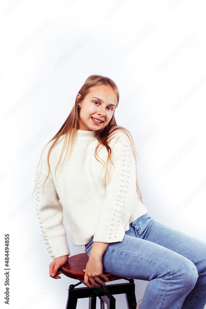 young pretty blond teenage girl emotional posing, happy smiling isolated on white background, lifestyle people concept