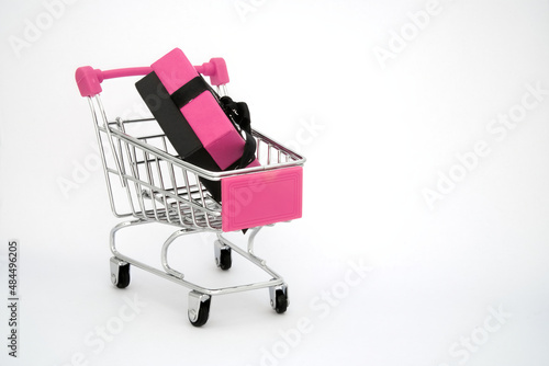 pink shopping cart with gift