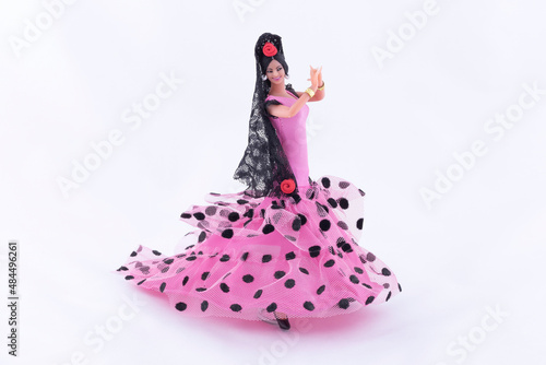 Flamenco Dancer Doll On A White Background photo