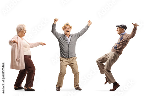 Happy elderly people dancing photo