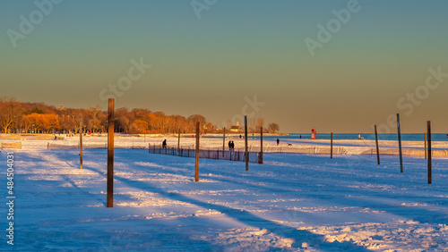 Beach volley ball courts covered in snow. Shot in late afternoon light,