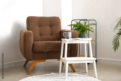 Cozy armchair, step stool w...
