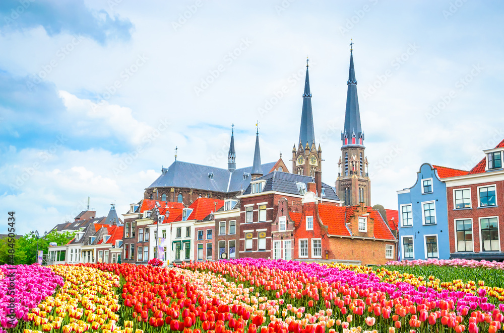 Traditional houses on Market square of old beautiful city Delft, Netherland