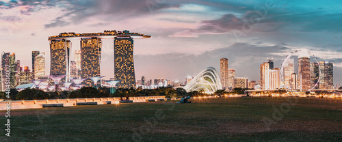 SSINGAPORE, SINGAPORE - MARCH 2019: Vibrant Singapore skyline at night photo