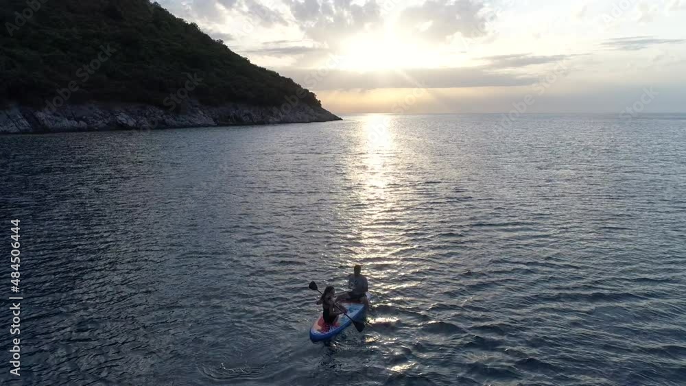 Paddleboard Adventure at Sunset (4K Aerial) Paddleboard Adventure at Sunset (4K Aerial)